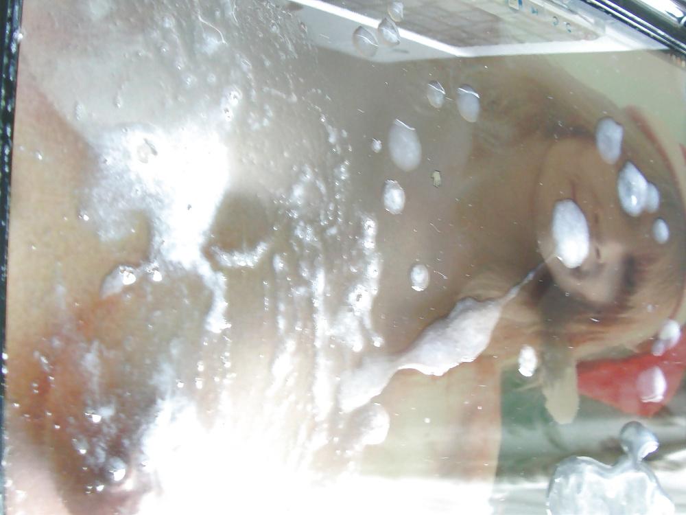 9P TosserTim makes a mess over Hottub Couple 69's tits