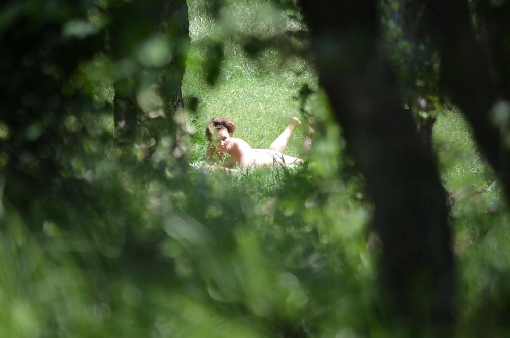 14P Sunbathing in the park