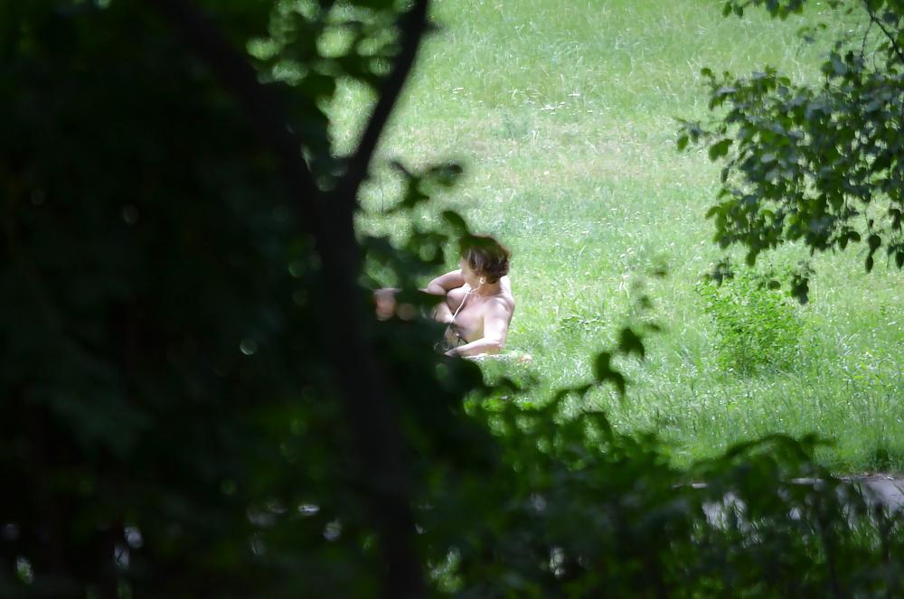 14P Sunbathing in the park