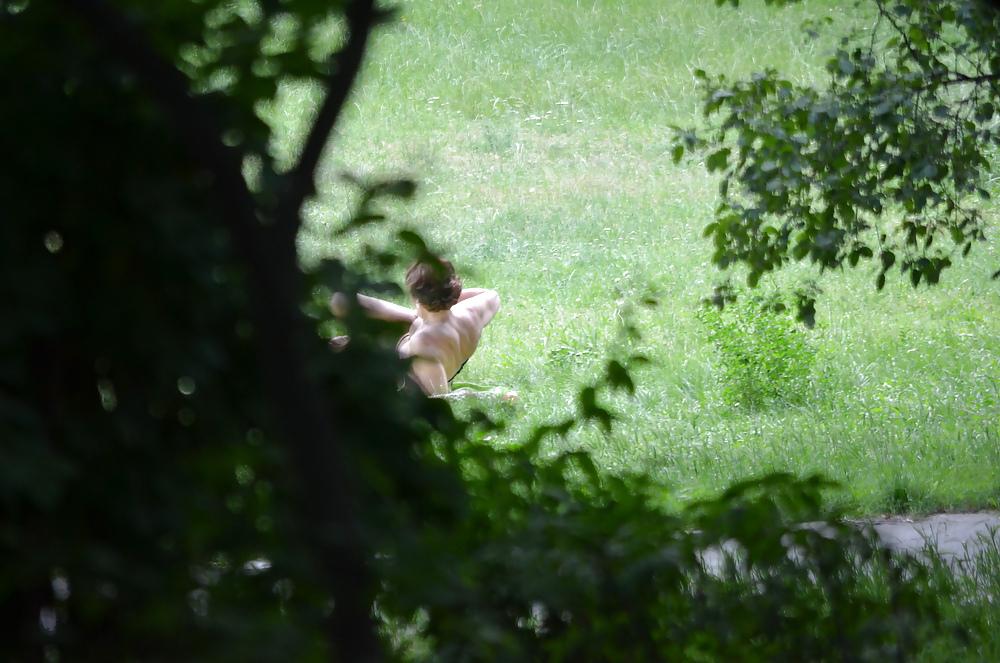 14P Sunbathing in the park