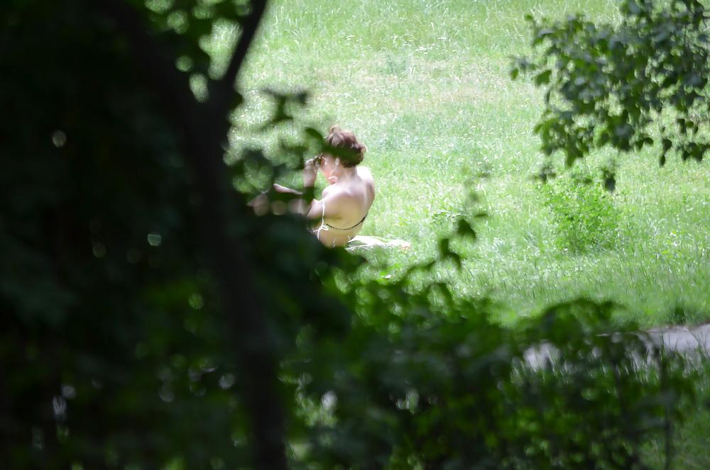 14P Sunbathing in the park