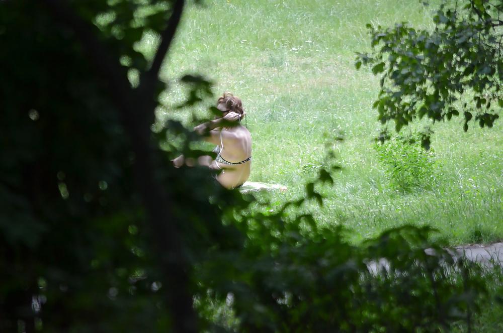 14P Sunbathing in the park