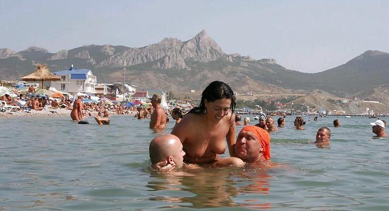 8P Nude Armenian Milf With Russian Guys On The Beach