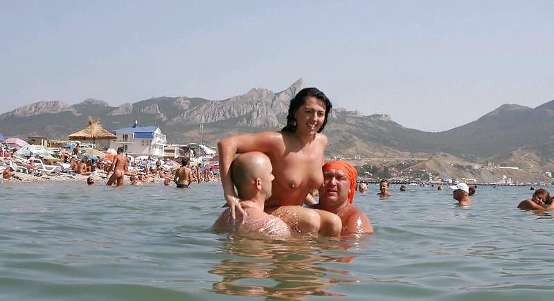 8P Nude Armenian Milf With Russian Guys On The Beach