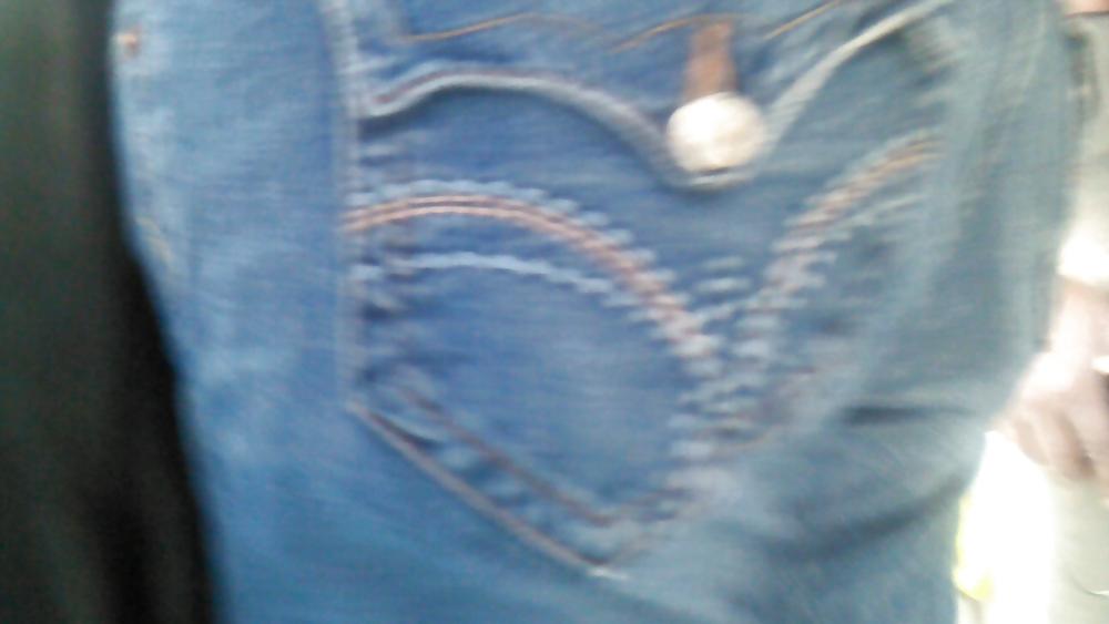 25P Voyeur - well-worn jeans and curves against the sun