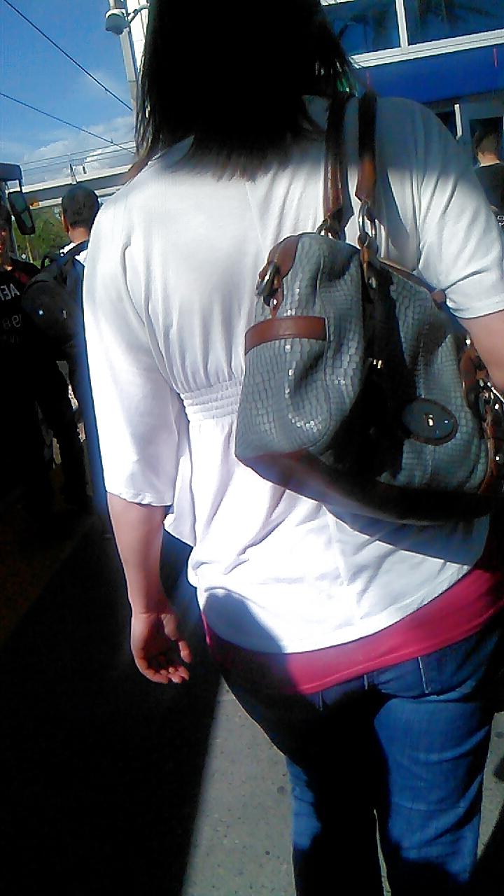 25P Voyeur - well-worn jeans and curves against the sun
