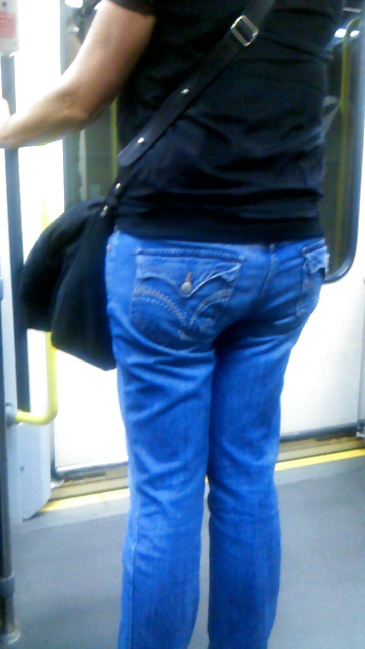 25P Voyeur - well-worn jeans and curves against the sun