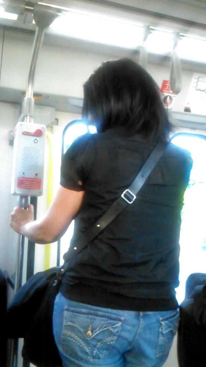 25P Voyeur - well-worn jeans and curves against the sun