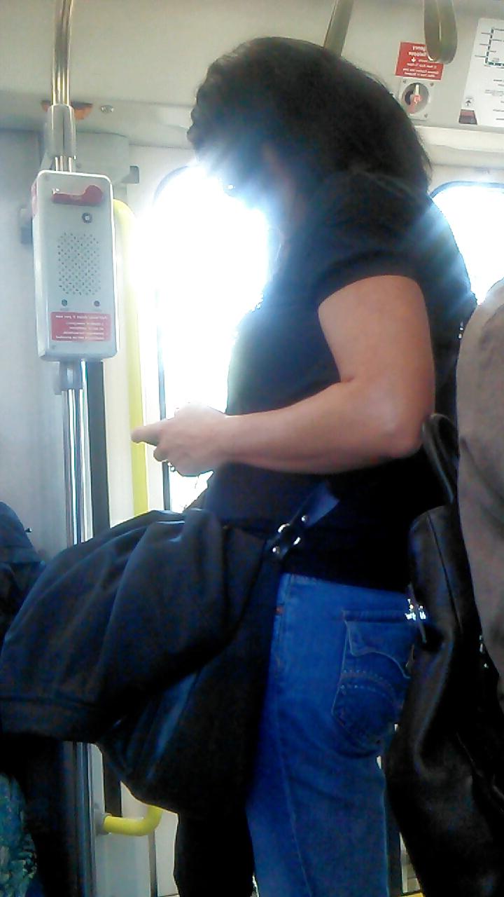 25P Voyeur - well-worn jeans and curves against the sun