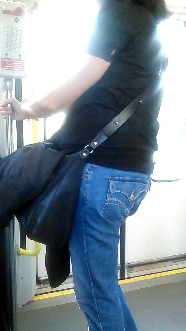 25P Voyeur - well-worn jeans and curves against the sun