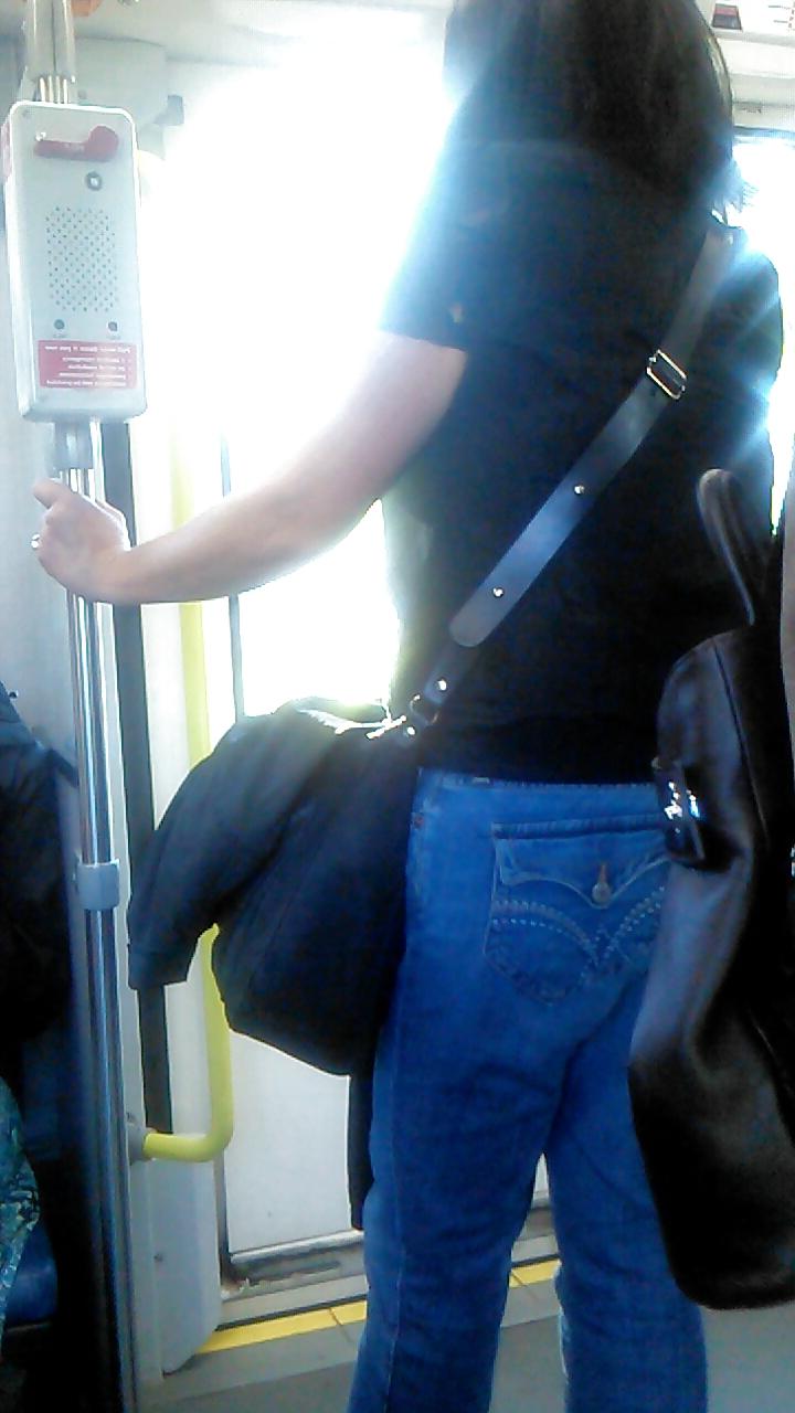 25P Voyeur - well-worn jeans and curves against the sun