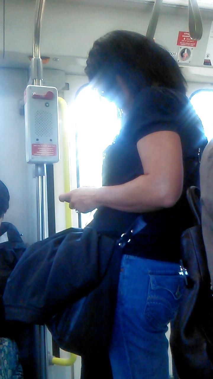 25P Voyeur - well-worn jeans and curves against the sun