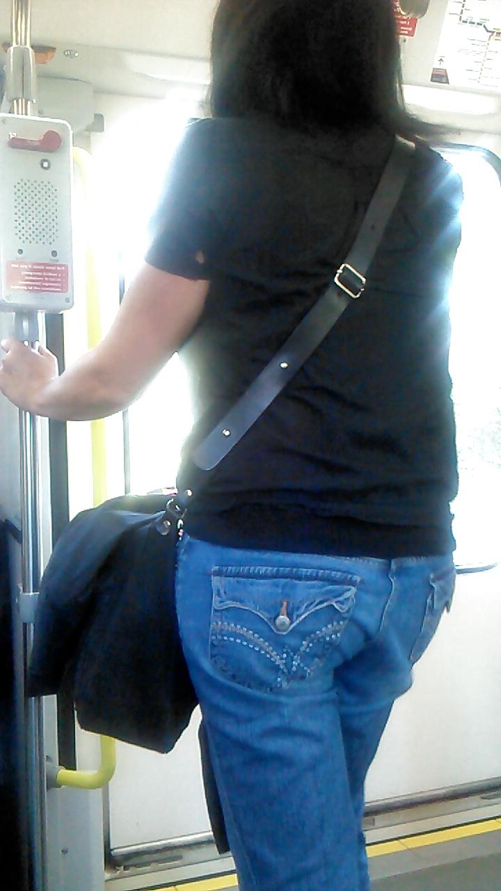 25P Voyeur - well-worn jeans and curves against the sun