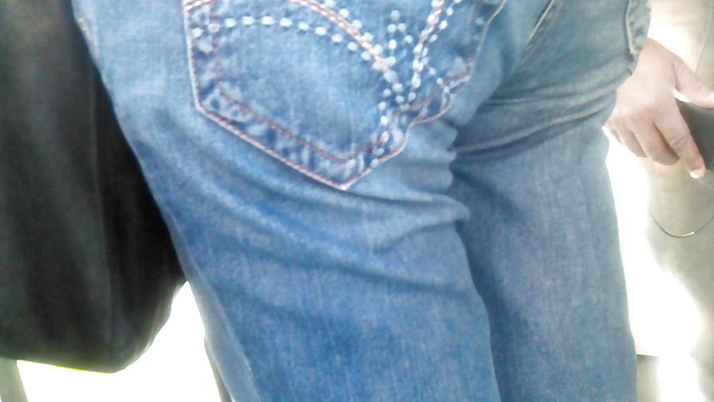 25P Voyeur - well-worn jeans and curves against the sun