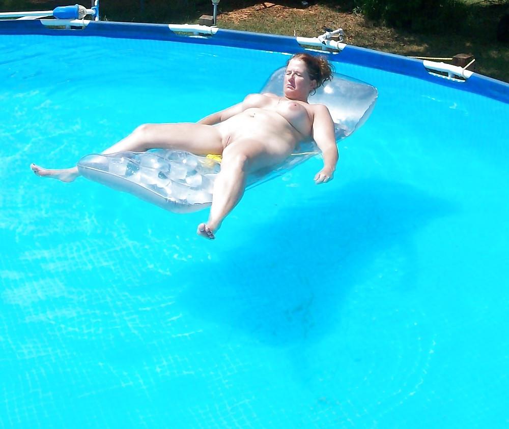 11P Horny Housewife in Pool Nude