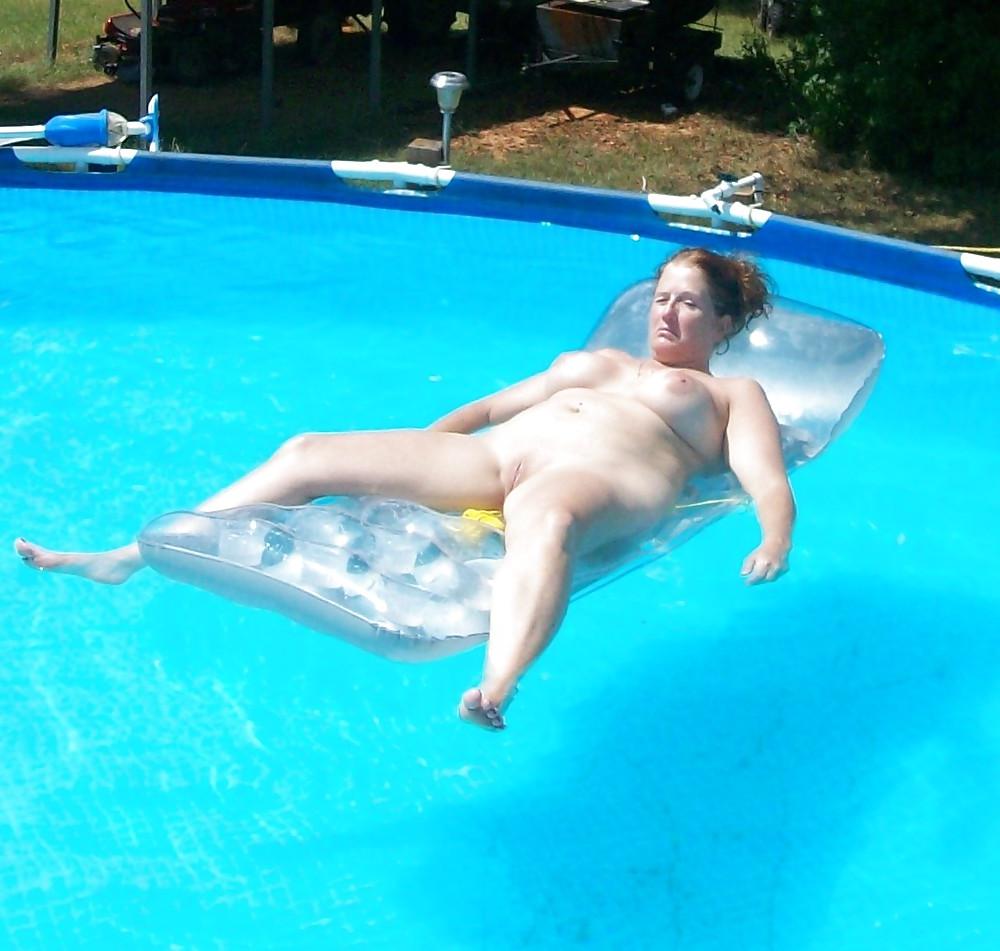 11P Horny Housewife in Pool Nude