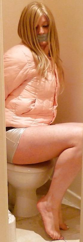 14P Cuffed and gagged in shiny shorts