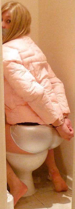 14P Cuffed and gagged in shiny shorts
