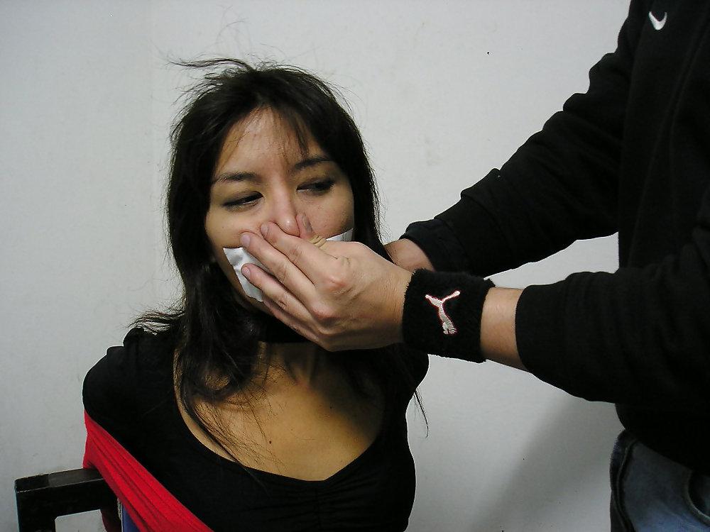 7P Tape gagged and nose shut