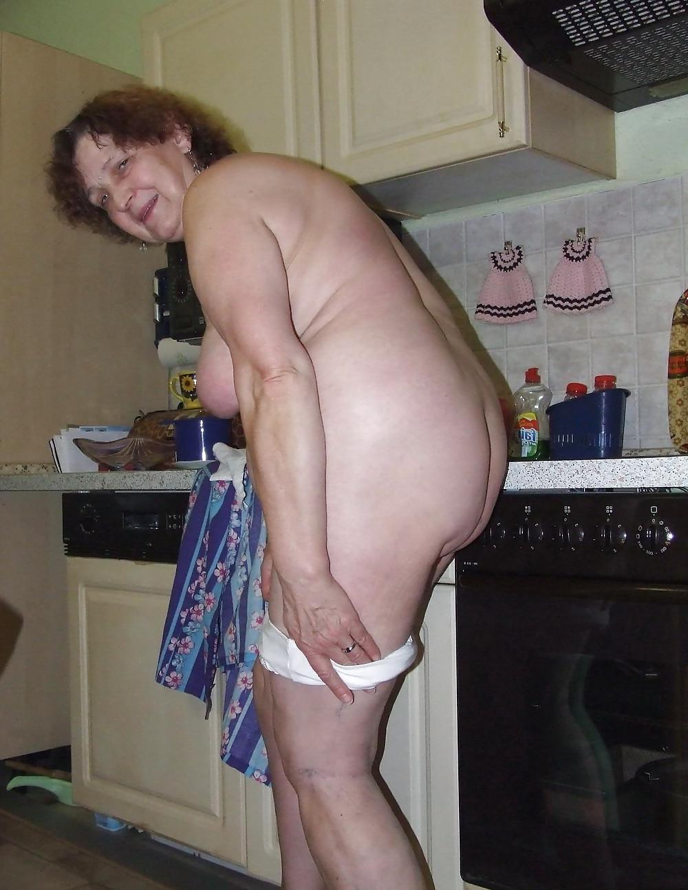 16P This housewife  loves to get naked in the kitchen