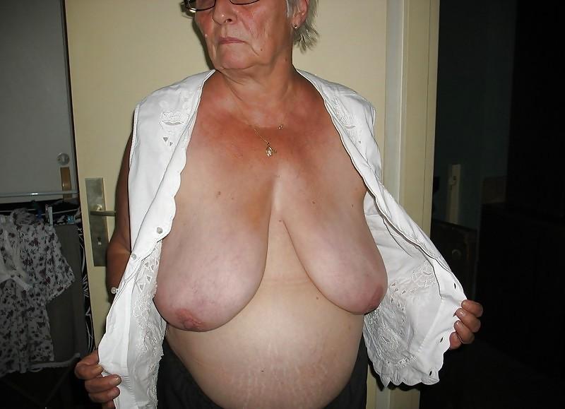7P Housewife showing her big breasts