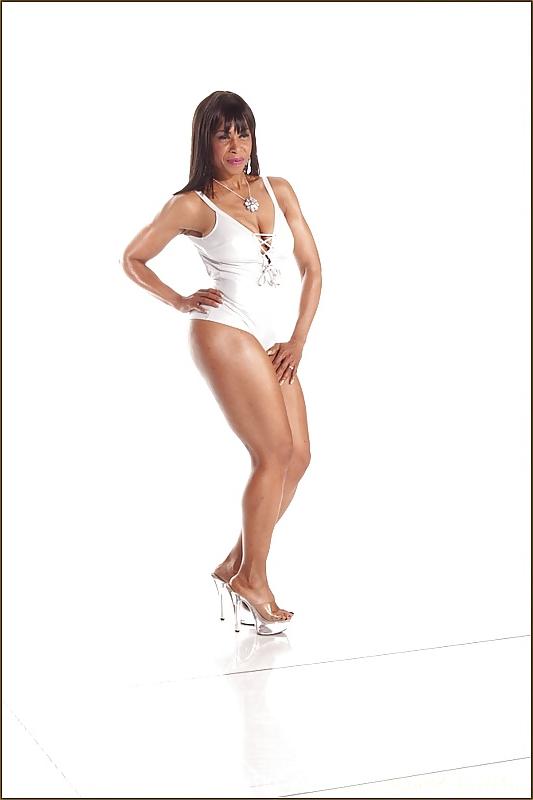 15P Athletic ebony milf Semmie De Suora, in the white nighty