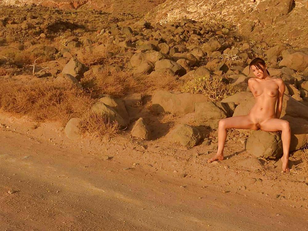 15P Wife teases car drivers by showing them pussy