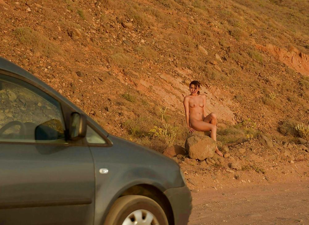 15P Wife teases car drivers by showing them pussy