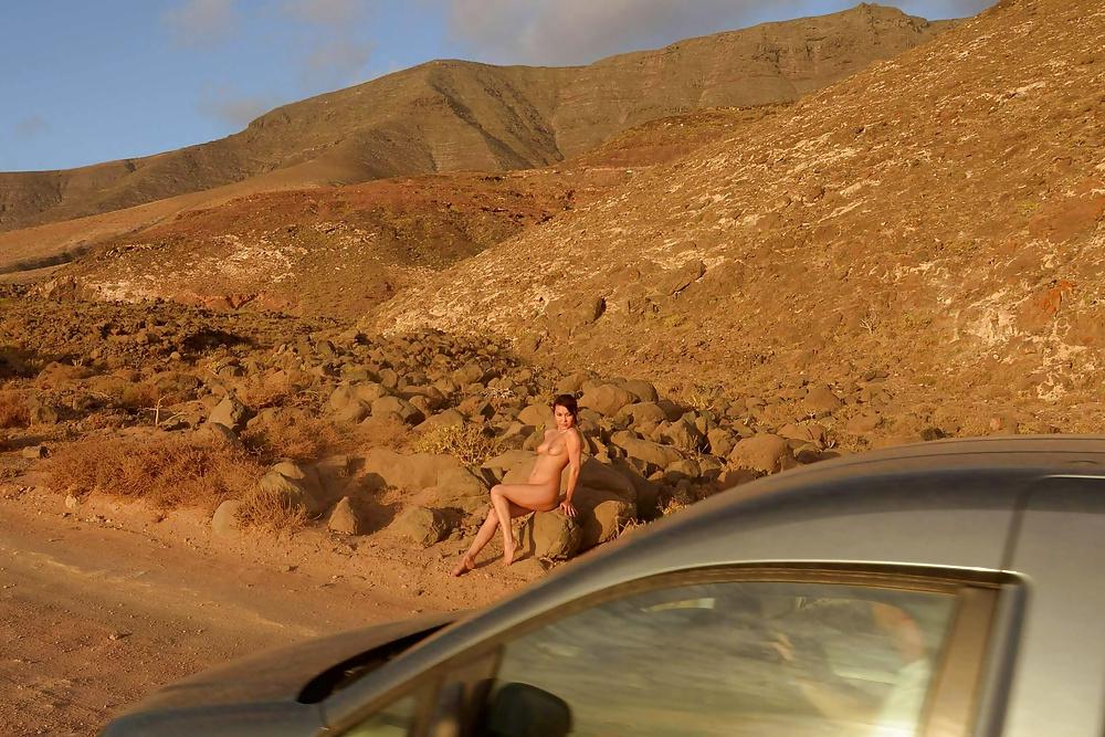 15P Wife teases car drivers by showing them pussy