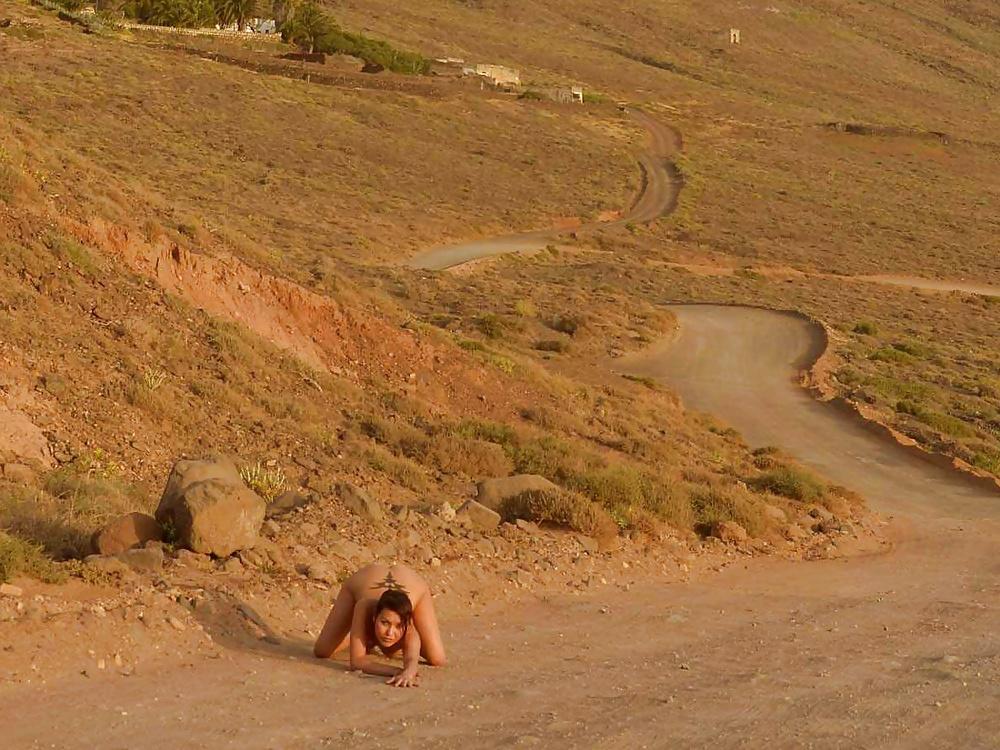 15P Wife teases car drivers by showing them pussy