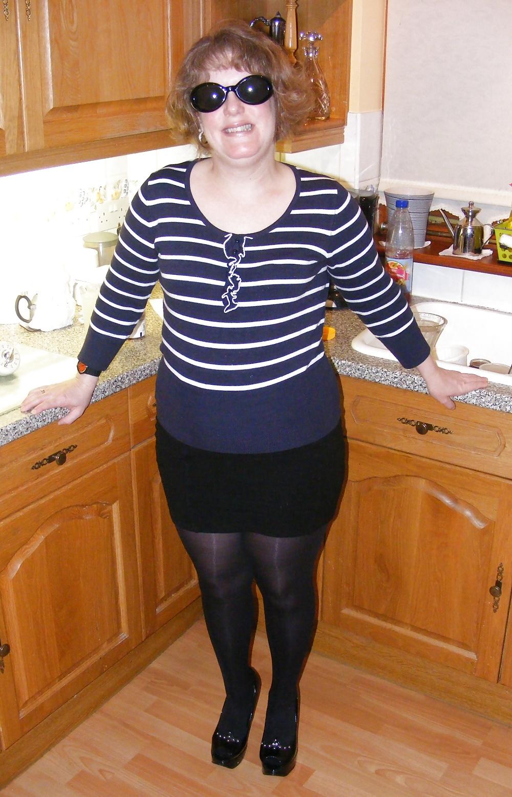 18P Shiny tights and black platforms