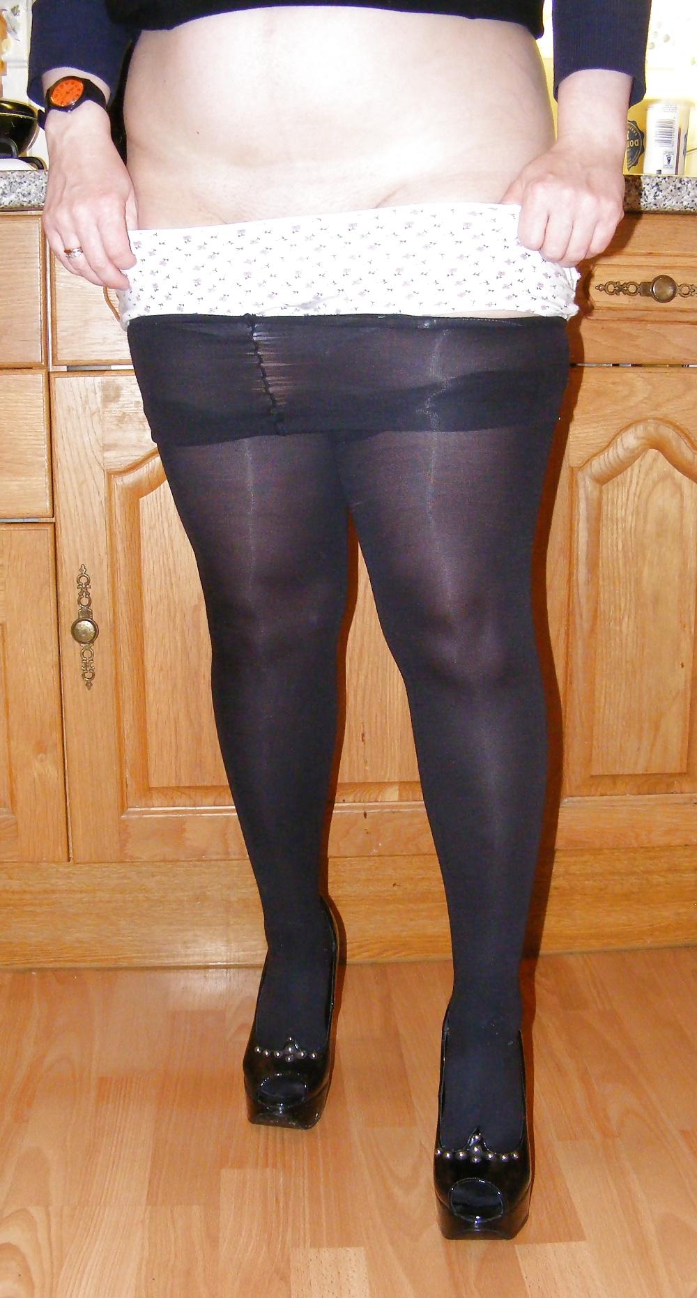 18P Shiny tights and black platforms