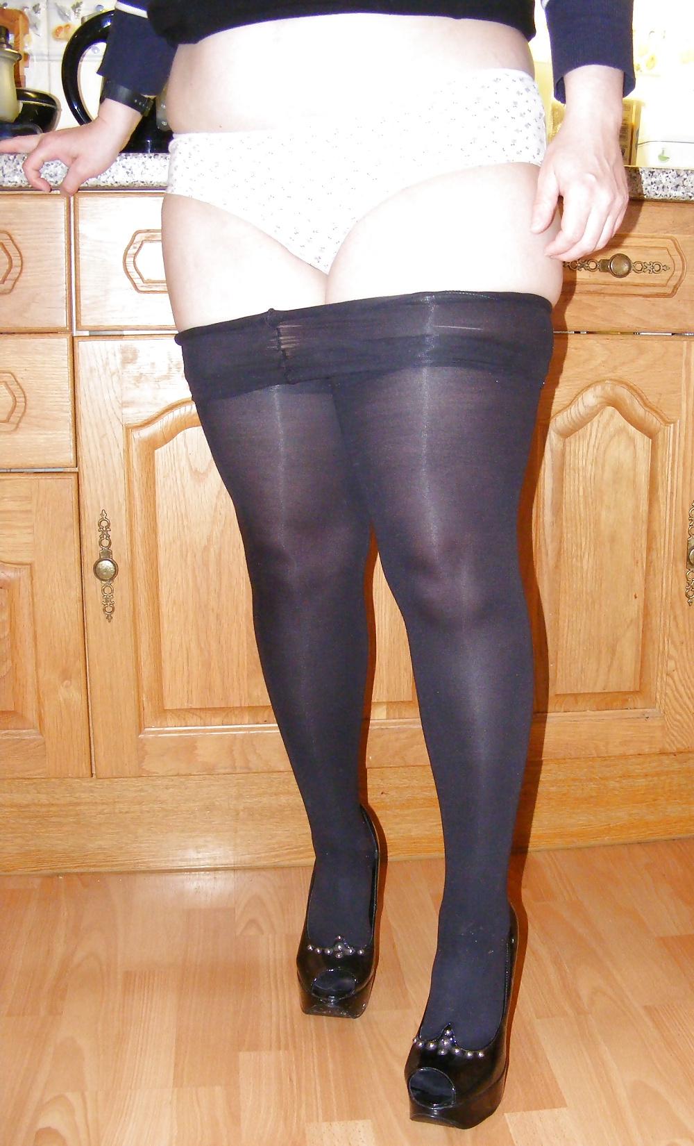 18P Shiny tights and black platforms
