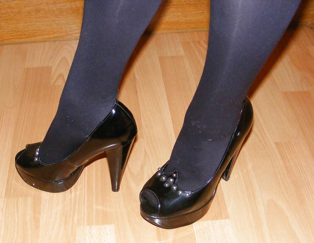 18P Shiny tights and black platforms
