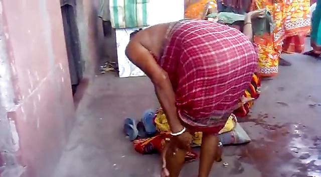 23P Half Naked Indian Aunty Bending Over