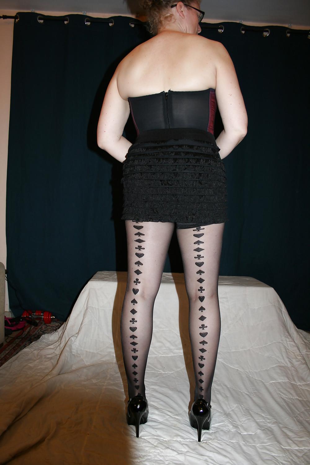 24P Short black frilly skirt, and stockings