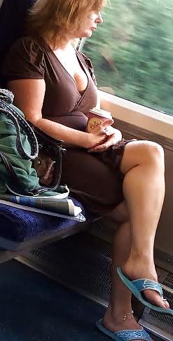 4P Candid milf flashing tits and legs on train