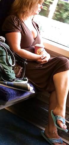 4P Candid milf flashing tits and legs on train