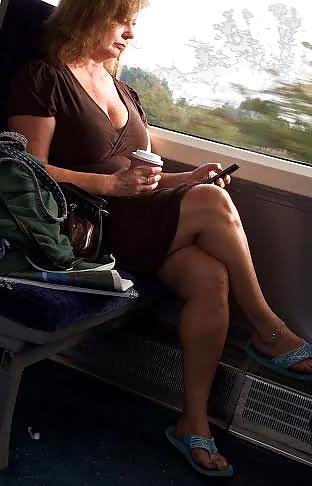 4P Candid milf flashing tits and legs on train