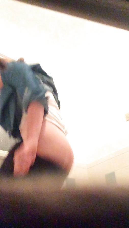 25P Innocent blonde prude looks into the camera