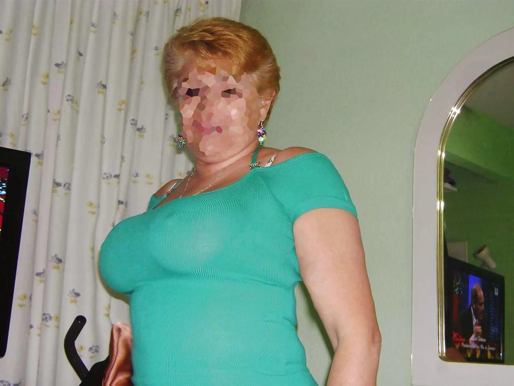 8P Latina cougar with fake tits
