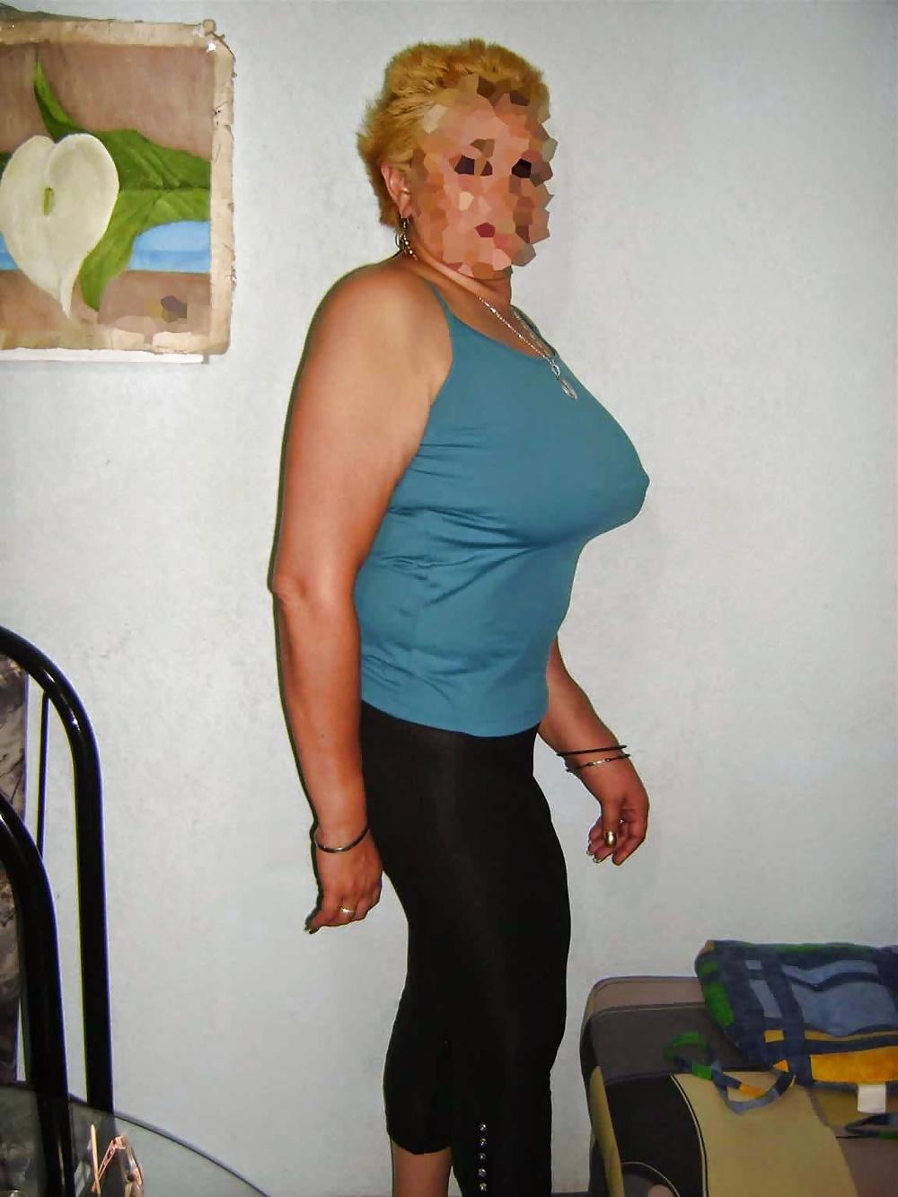 8P Latina cougar with fake tits