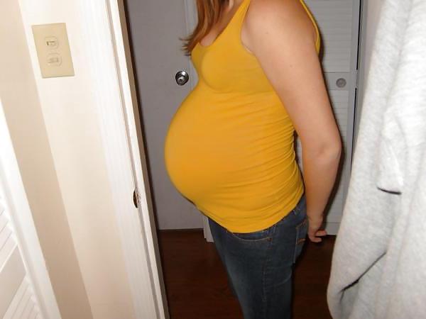 17P Big pregnant belly in tight clothes