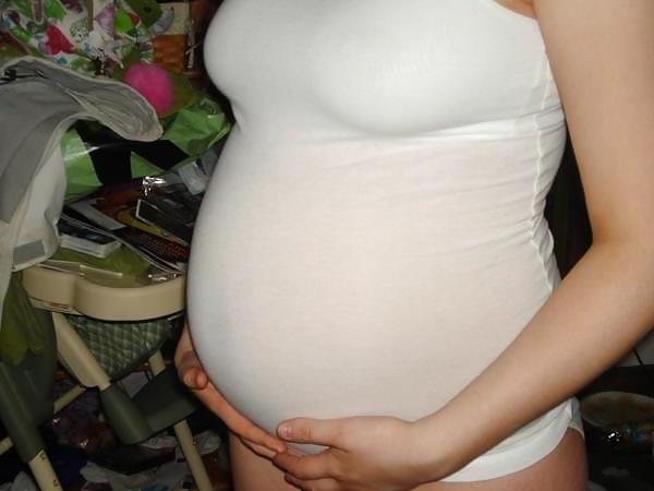 17P Big pregnant belly in tight clothes