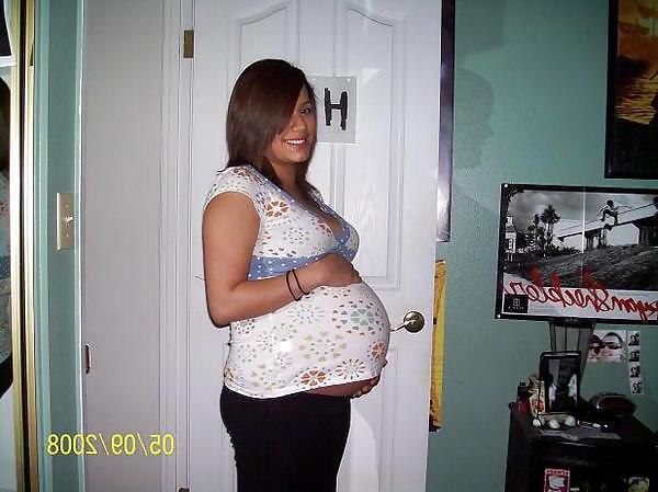 17P Big pregnant belly in tight clothes