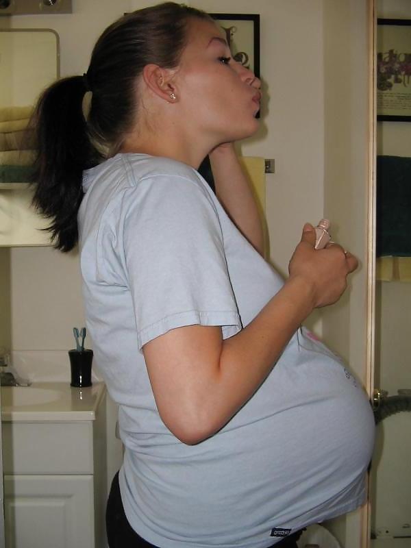 17P Big pregnant belly in tight clothes