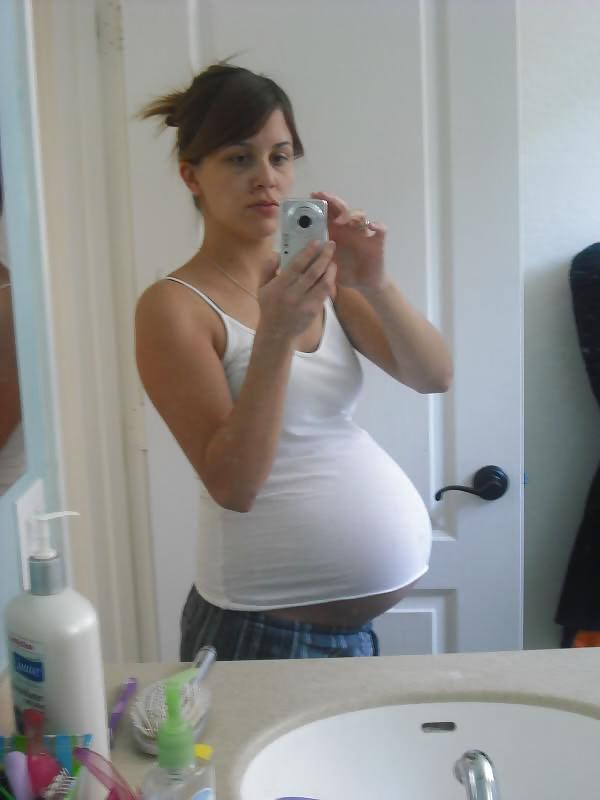 17P Big pregnant belly in tight clothes