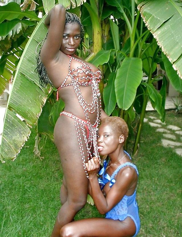 21P Malika having lesbian fun in the garden