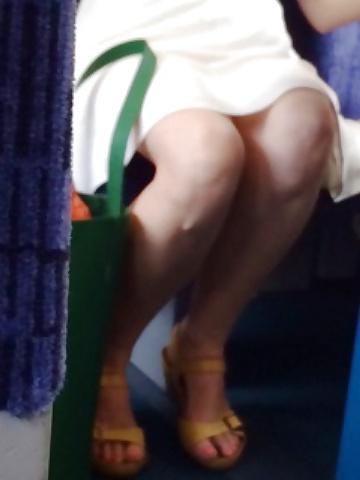 13P Milf shows legs and upskirt on train