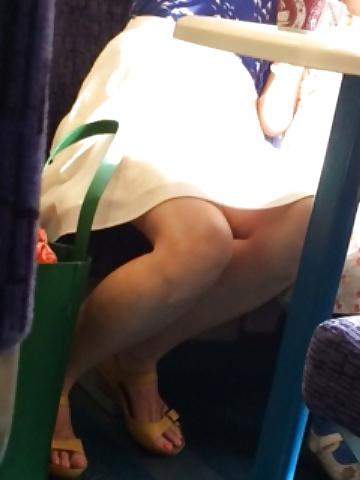 13P Milf shows legs and upskirt on train